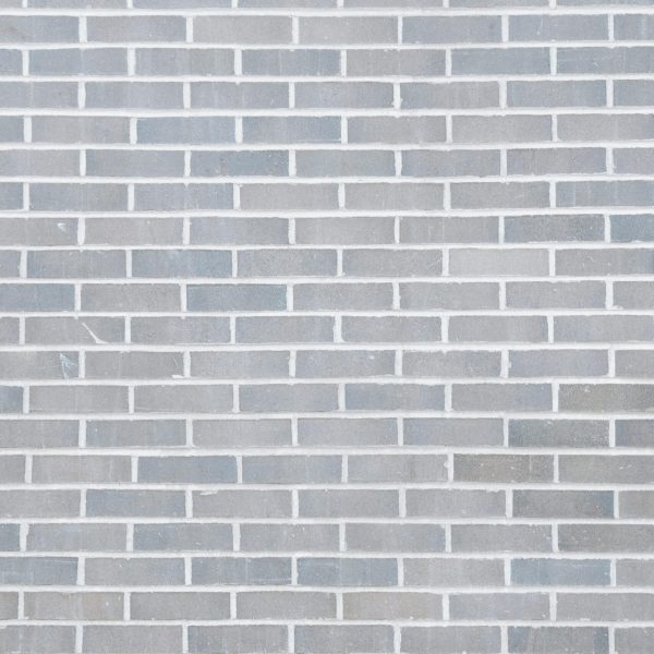 pexels-photo-7078692-7078692 Full frame background of empty gray wall build with rows of brick blocks
